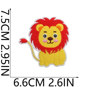 Detailed view of cartoon lion embroidery patch in red and yellow with size markings