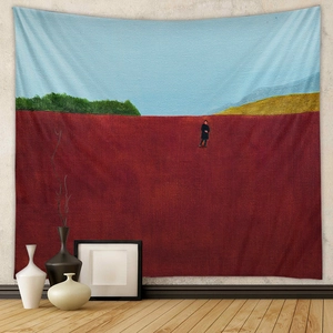 Close-up of bohemian landscape tapestry showing fine canvas texture and minimalist art