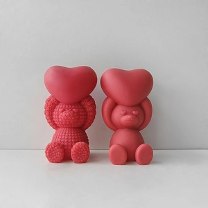 Detail of bear silicone molds featuring rose textures and smooth surfaces with heart shapes