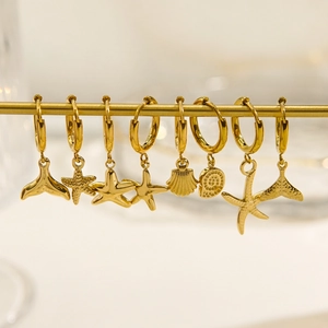 Elegant 14K gold plated stainless steel hoop earrings with ocean charms for beach style