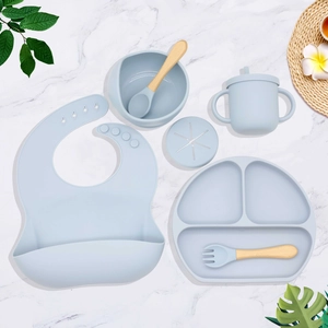 Silicone baby feeding set with suction plate, bowl, bib and wooden handle utensils