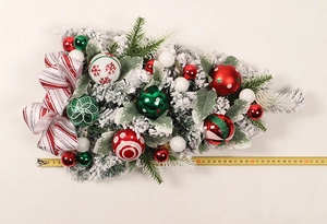 Close-up of a 53cm Christmas teardrop swag with ornaments and measurement tape
