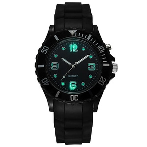 Detailed view of the luminous dial and hands on this stylish black quartz watch