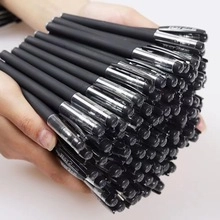Bulk pack of high-capacity black ink pens held together to show large quantity supply