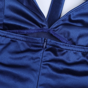 Detail of invisible zipper on deep blue satin dress with seamless stitching craftsmanship