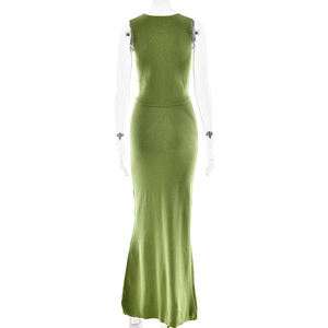Detailed view of the slim-fit green sleeveless knitted maxi dress on a mannequin