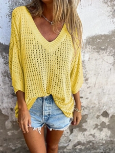 Oversized bright yellow V-neck openwork knit sweater with a stylish hollow mesh design