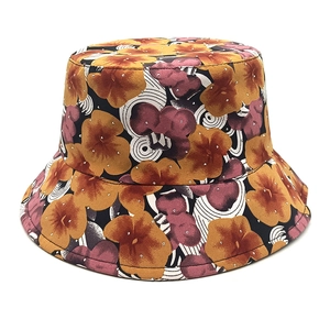 Detail of floral bucket hat with vibrant digital print and micro rhinestone accents