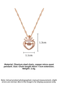 Detail of rose gold crown heart necklace with pink gemstone and titanium chain size info