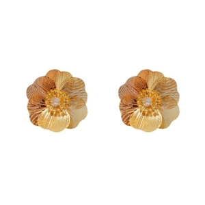 Gold plated hollow flower stud earrings with sparkling crystal centers on white background