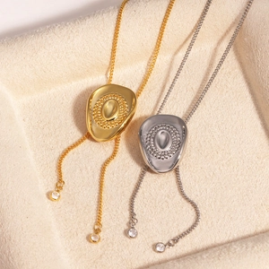 Minimalist cowboy hat pendant necklace in gold and silver with adjustable sliding chain
