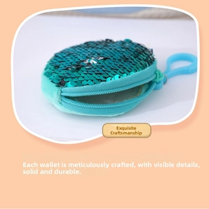 Close-up of sparkling teal sequins and soft plush fabric on the round mini coin purse