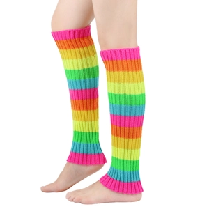 Detailed knit texture of colorful rainbow striped leg warmers with ribbed edges