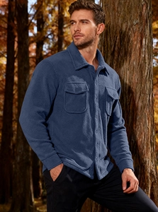 Detailed close-up of dark blue fleece tactical shirt jacket featuring chest flap pockets