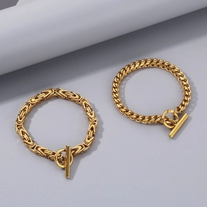 Golden stainless steel Byzantine and Cuban link chain bracelets with designer OT toggle clasp