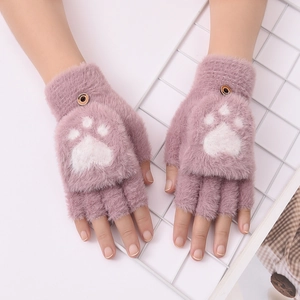 Close-up of pink plush fingerless gloves with white cat paw pattern and flip top
