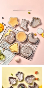 Vista dettagliata di vari stampi per dolci antiaderenti in forme festive diverse