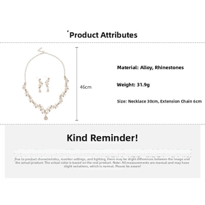 Detail view of rhinestone floral teardrop pendant necklace and earrings jewelry set