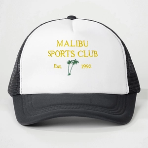 Detail of Malibu Sports Club embroidery and palm tree graphic on a mesh trucker hat