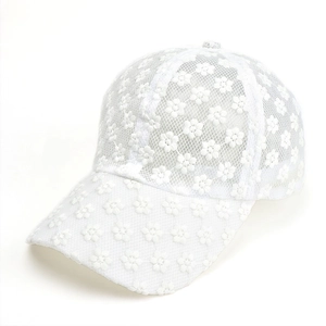 Detailed close-up of white floral lace embroidery and breathable mesh on baseball cap
