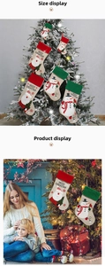 Detailed Christmas stockings with Santa and Snowman patterns hanging on a decorated tree