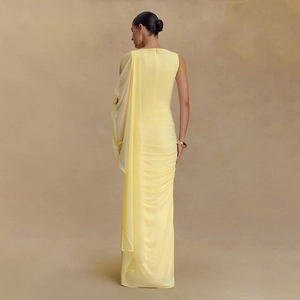 Elegant light yellow slim-fit evening gown with one-shoulder drape and mesh details