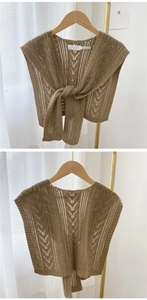 Detailed front and back view of brown hollow-out knitted shawl with tie-front design