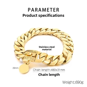 Detail of 31mm wide golden Cuban dog chain with engraved buckle and circular ID tag
