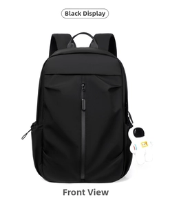 Front view of black waterproof oxford backpack with vertical zipper and astronaut charm