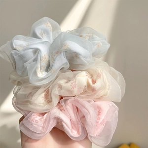 Three-piece floral mesh oversized scrunchies in light blue, beige, and pink colors