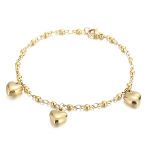 Elegant gold heart charm beaded bracelet with three polished hearts and lobster clasp