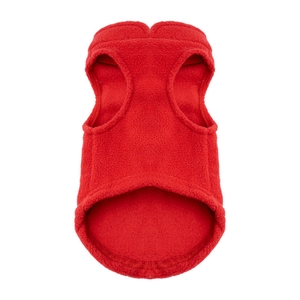 Close-up of a bright red fleece dog vest with leash rings on a white background
