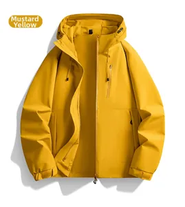 Detail of mustard yellow windproof jacket featuring zip pocket and adjustable hood
