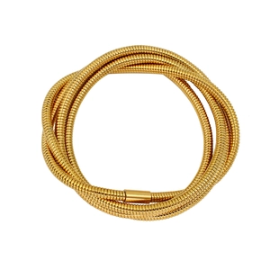 Detail of a multi-layer gold snake chain bracelet with a smooth cylindrical clasp