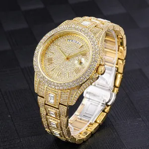 Luxury gold iced-out business watch with dual calendar display and roman numerals