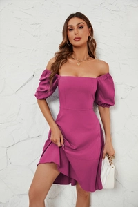 Close-up detail of the puff sleeves and square neckline on this magenta summer dress