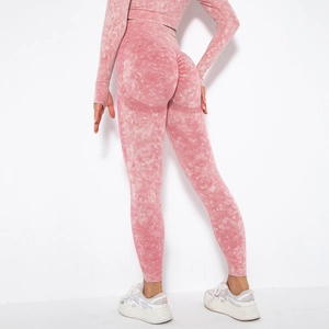 Detail view of pink acid wash seamless leggings with scrunch butt lifting texture