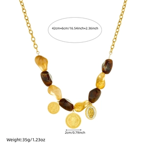 Retro vintage gold chain necklace with amber resin beads and round coin pendants