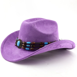 Detail of purple faux suede cowboy hat featuring a beaded ethnic band and blue gemstone