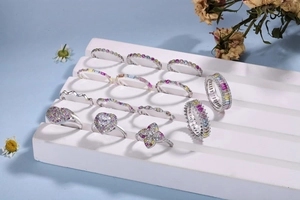 Macro display of assorted S925 sterling silver rings with colorful cubic zirconia