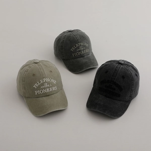Detailed trio of washed cotton baseball caps with vintage embroidery and worn texture