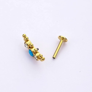 Piercing lèvre et oreille en acier 316L doré avec opale bleue et oxydes de zirconium