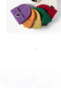 Close-up of ribbed knit beanie collection featuring a P embroidered patch in various colors