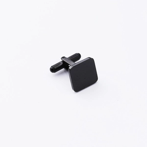 Detailed view of square black stainless steel cufflink with polished finish and swivel post