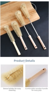 Detail of four long-handled bottle brushes with wooden handles and dense nylon bristles