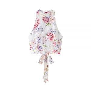 Détail du haut dos nu à fleurs avec motif floral rose et violet et nœud à nouer