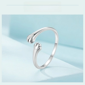Macro detail of S925 sterling silver stamp on an adjustable cute cat paw ring