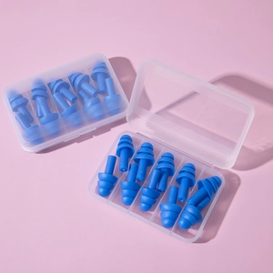 Detailed view of two boxes of blue silicone tree-shaped noise cancelling earplugs