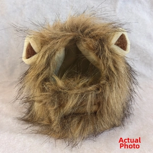 Detailed view of brown plush lion mane headwear for cats with faux fur and round ears