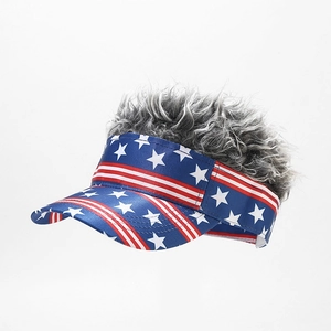 Detail of USA flag baseball cap featuring red white stripes and grey synthetic wig hair